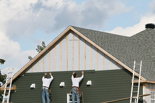 Professional Siding technician working in Smithfield, NC